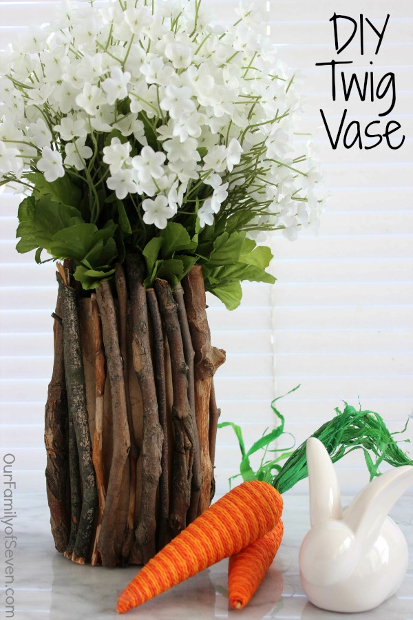 This DIY Twig Vase is SUPER Easy and SUPER Inexpensive- It will make for a perfect accessory for your spring or all year long decor.