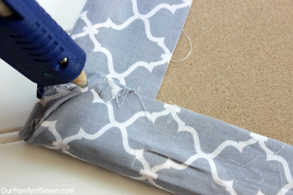 Fabric Covered Bulletin Board- Super Easy and Super Inexpensive home decor project.