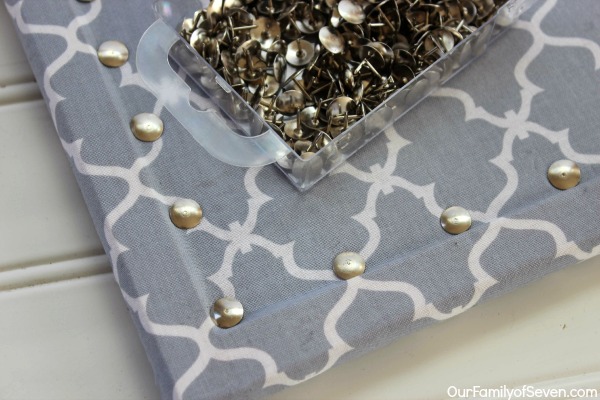 Fabric Covered Bulletin Board- Super Easy and Super Inexpensive home decor project.