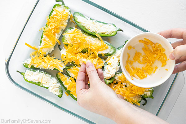 Topping peppers with cheese