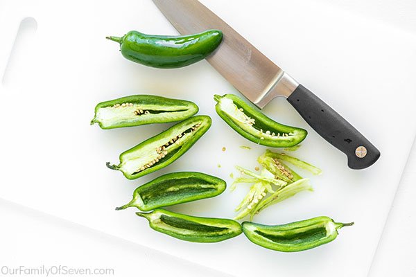 Slicing jalapeno peppers